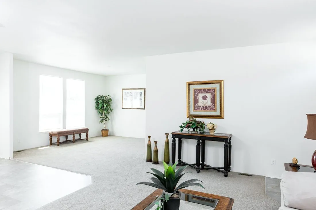 The 2025 COLUMBIA RIVER (NEW) Living Room. This Manufactured Mobile Home features 4 bedrooms and 2 baths.