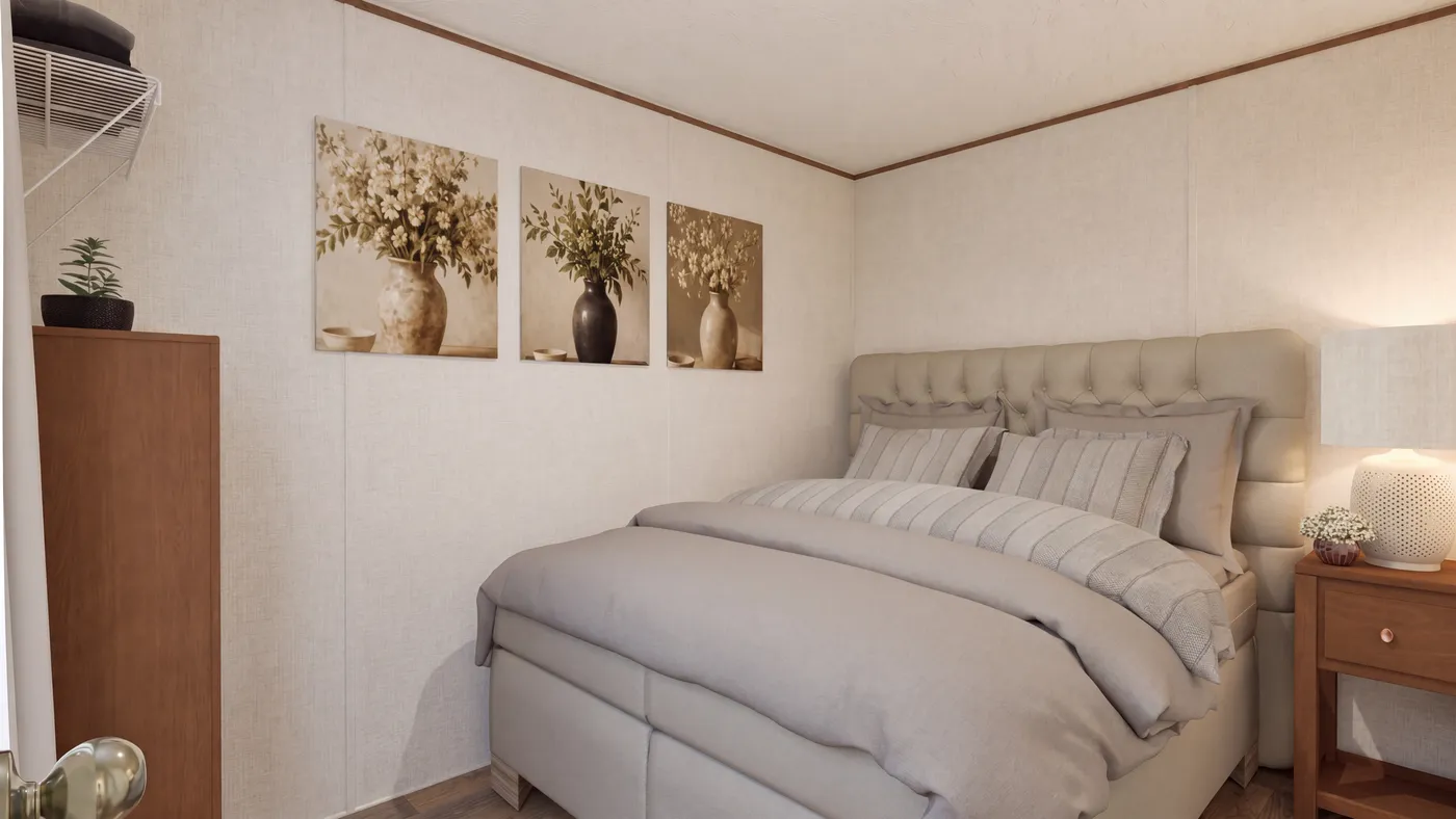 The BUTTERCUP Primary Bedroom. This Manufactured Mobile Home features 1 bedroom and 1 bath.