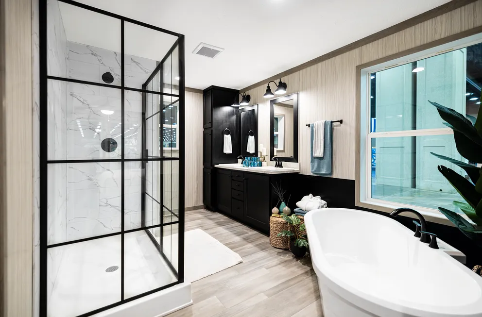 The 6428-E792 THE PULSE Primary Bathroom. This Manufactured Mobile Home features 3 bedrooms and 2.5 baths.