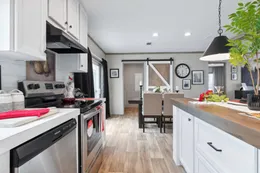 The THE REAL DEAL Kitchen. This Manufactured Mobile Home features 3 bedrooms and 2 baths.