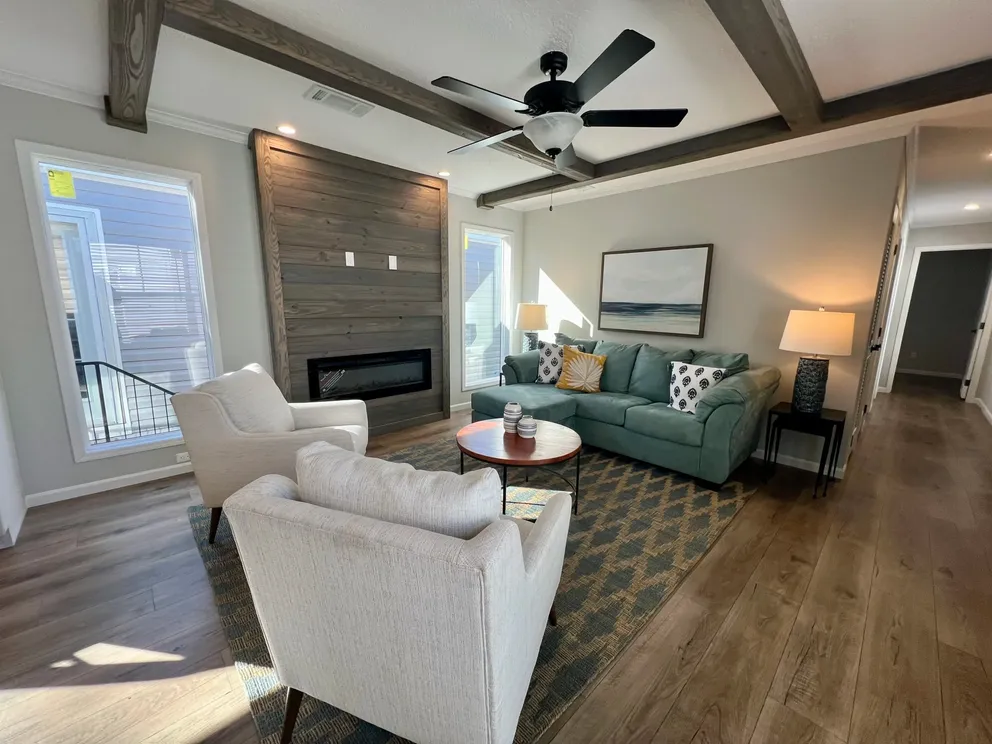 The THE TRUMAN Living Room. This Manufactured Mobile Home features 3 bedrooms and 2 baths.