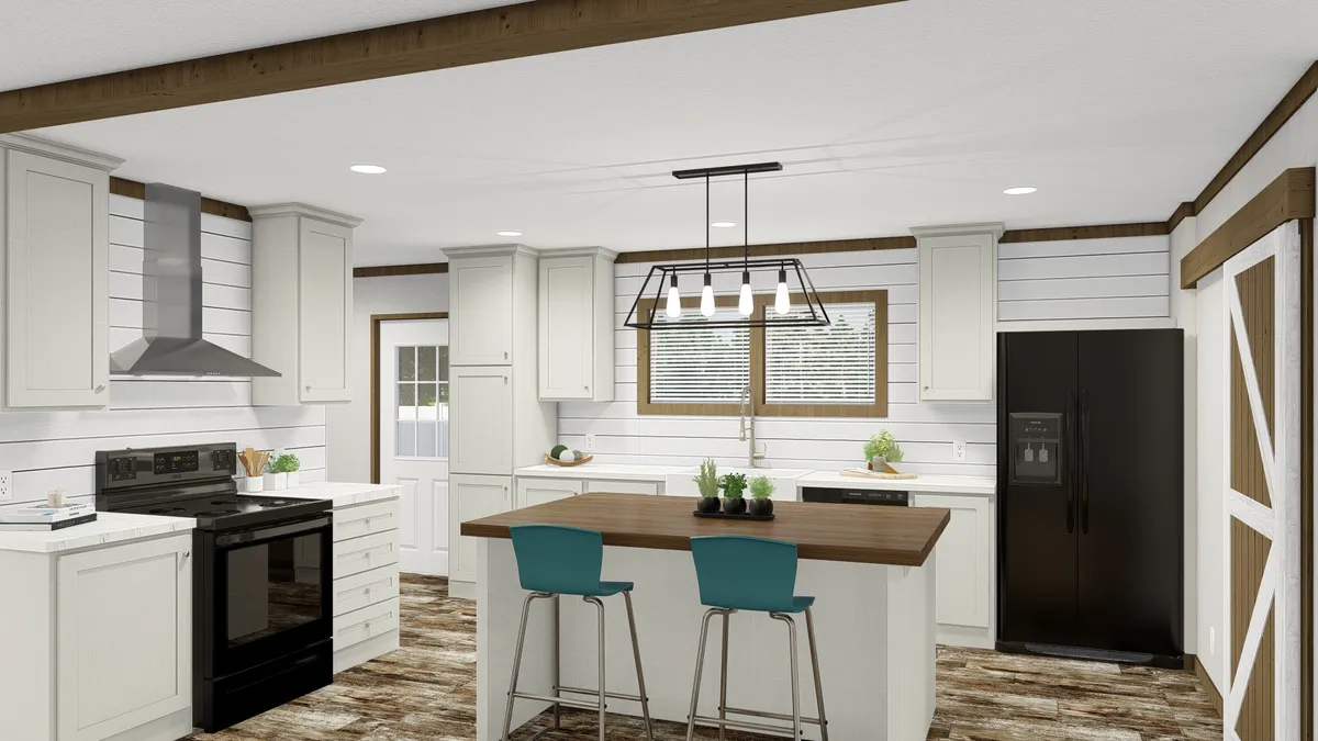 The HOMESTEAD BREEZE Kitchen. This Manufactured Mobile Home features 4 bedrooms and 2 baths.