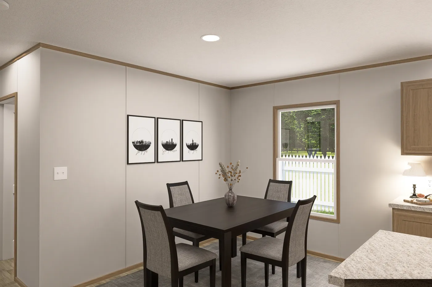 The THE EAGLE 60 Dining Room. This Manufactured Mobile Home features 3 bedrooms and 2 baths.