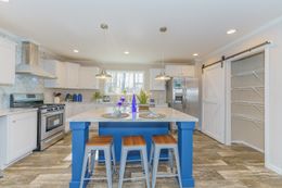 The SWEET BREEZE 72 Kitchen. This Manufactured Mobile Home features 4 bedrooms and 2 baths.