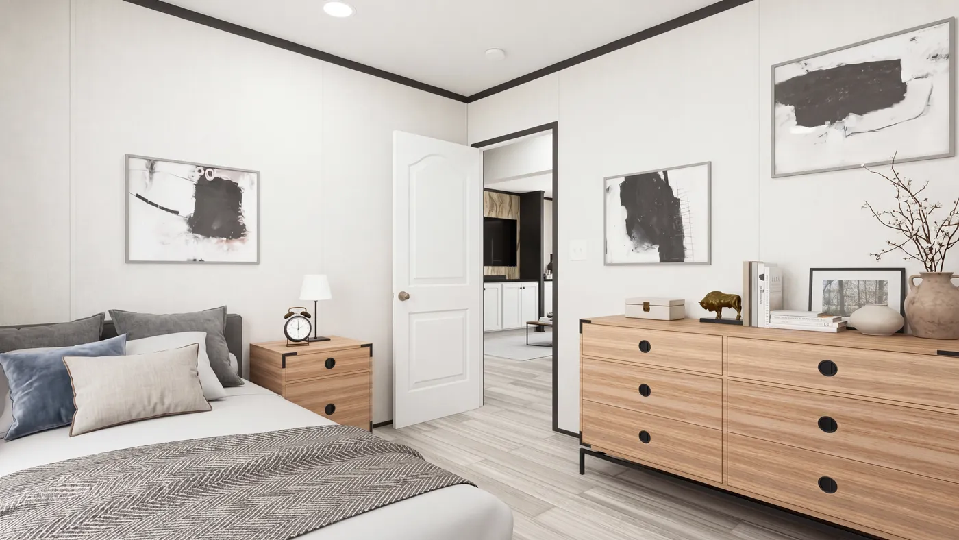The THE MOUNTAINEER 56 Bedroom. This Manufactured Mobile Home features 3 bedrooms and 2 baths.