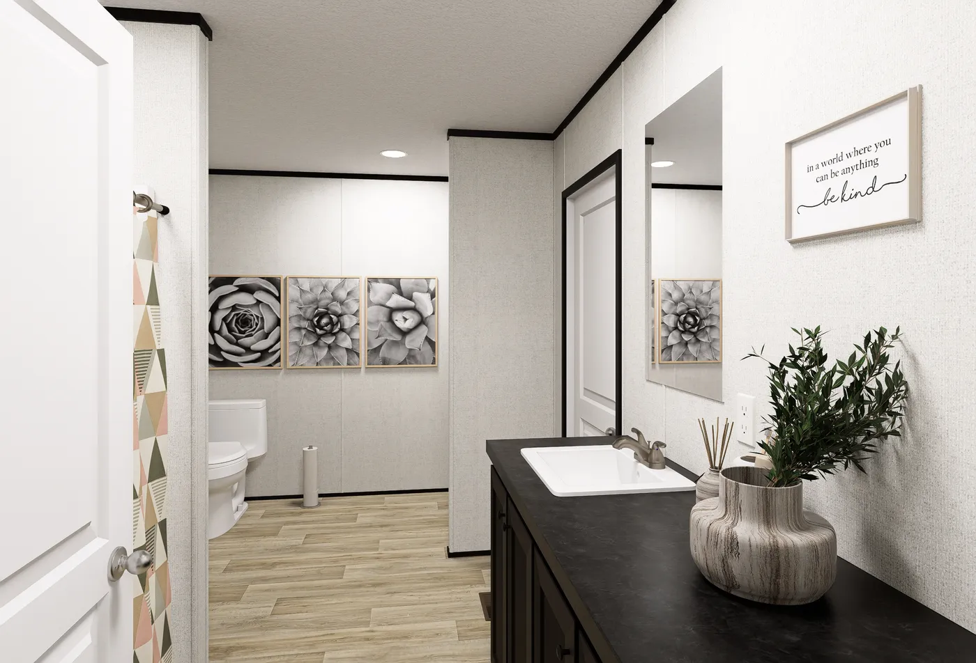 The ECLIPSE Primary Bathroom. This Manufactured Mobile Home features 4 bedrooms and 2 baths.