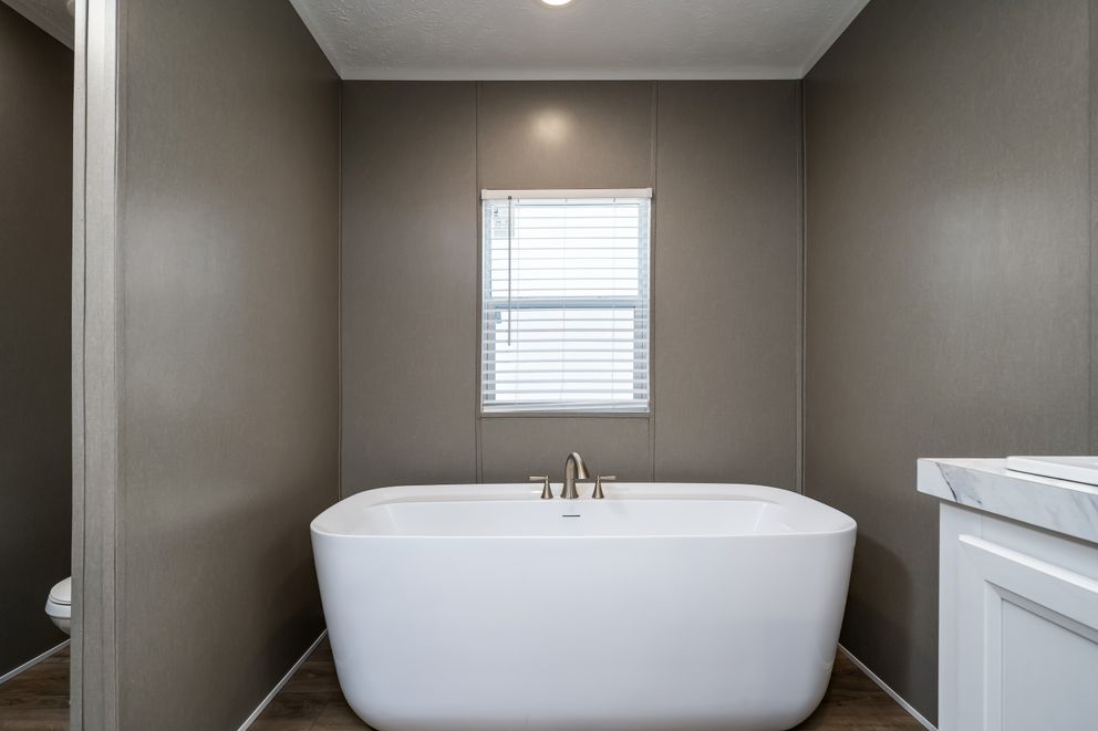 The SAVANNAH BREEZE Exterior. This Manufactured Mobile Home features 3 bedrooms and 2 baths.