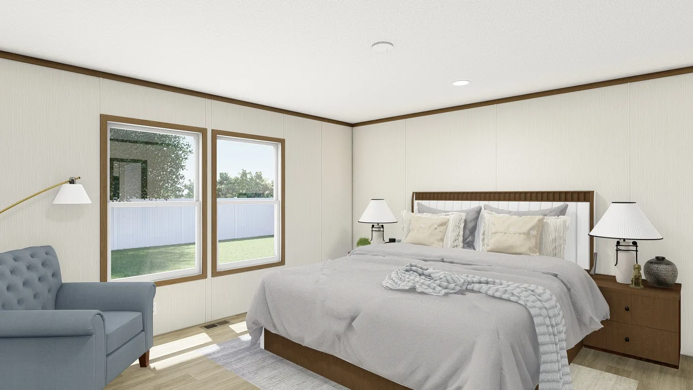 The THE EMPOWER Primary Bedroom. This Manufactured Mobile Home features 4 bedrooms and 2 baths.