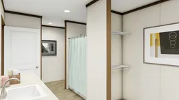 The COLOSSAL Primary Bathroom. This Manufactured Mobile Home features 3 bedrooms and 2 baths.