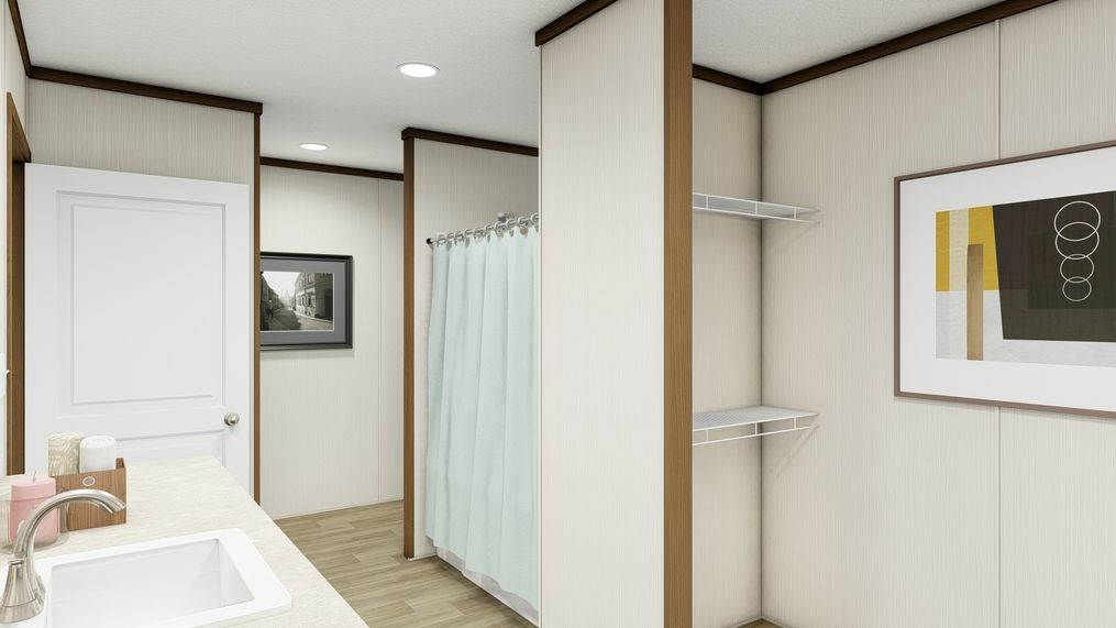 The COLOSSAL Primary Bathroom. This Manufactured Mobile Home features 3 bedrooms and 2 baths.