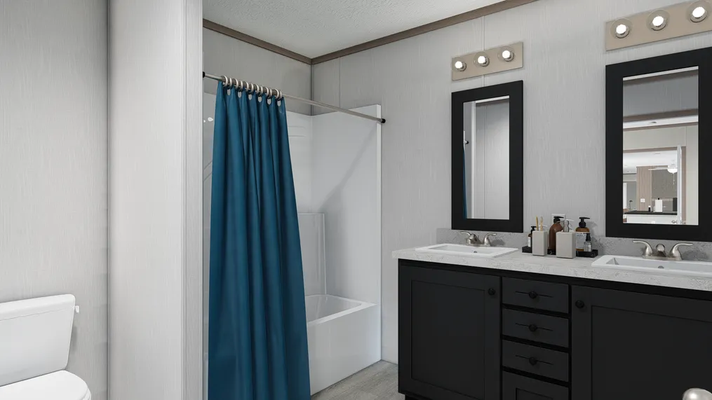 The 7616-4700 THE PULSE Primary Bathroom. This Manufactured Mobile Home features 3 bedrooms and 2 baths.