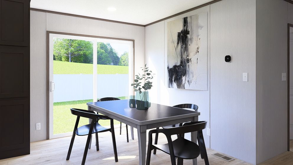 The ULTRA PRO HERCULES 28X68 3BR Dining Area. This Manufactured Mobile Home features 3 bedrooms and 2 baths.