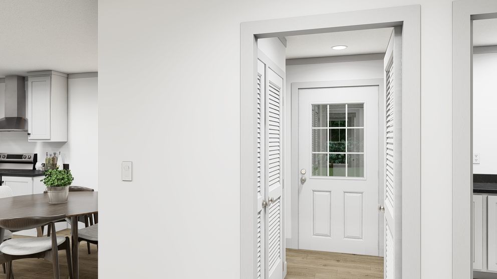 The WONDERFUL WORLD Foyer. This Manufactured Mobile Home features 3 bedrooms and 2 baths.