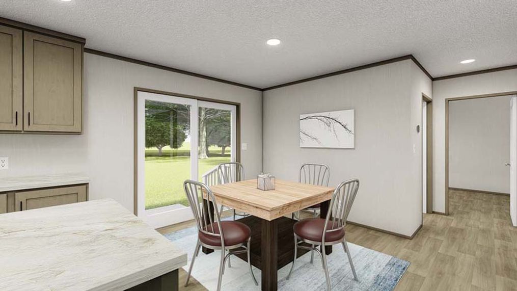 The RIO Dining Room. This Manufactured Mobile Home features 3 bedrooms and 2 baths.