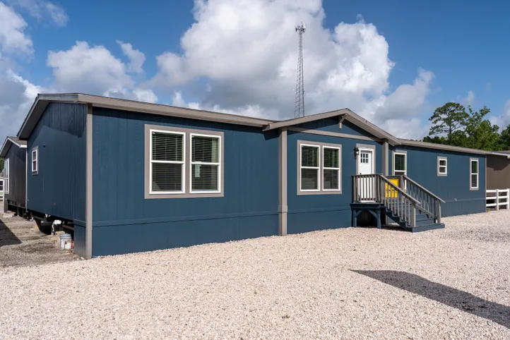 The EL SUENO BREEZE Exterior. This Manufactured Mobile Home features 4 bedrooms and 2 baths.