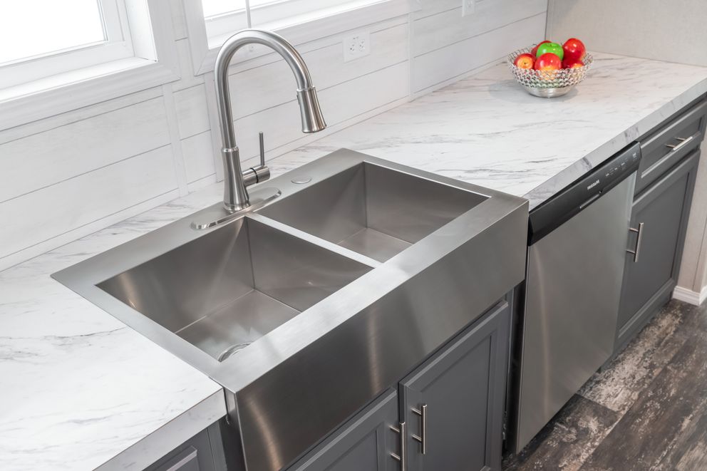 The ALL AMERICAN Kitchen. This Manufactured Mobile Home features 3 bedrooms and 2 baths.