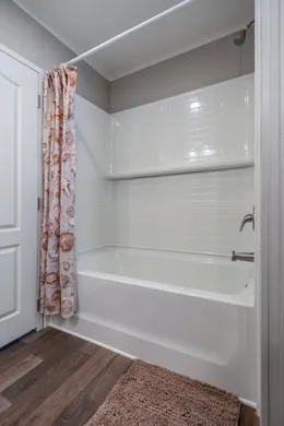 The TRADITION 72 Guest Bathroom. This Manufactured Mobile Home features 4 bedrooms and 2 baths.