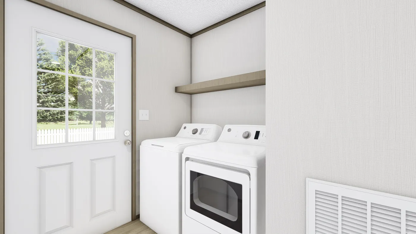 The LEWIS Utility Room. This Manufactured Mobile Home features 2 bedrooms and 2 baths.