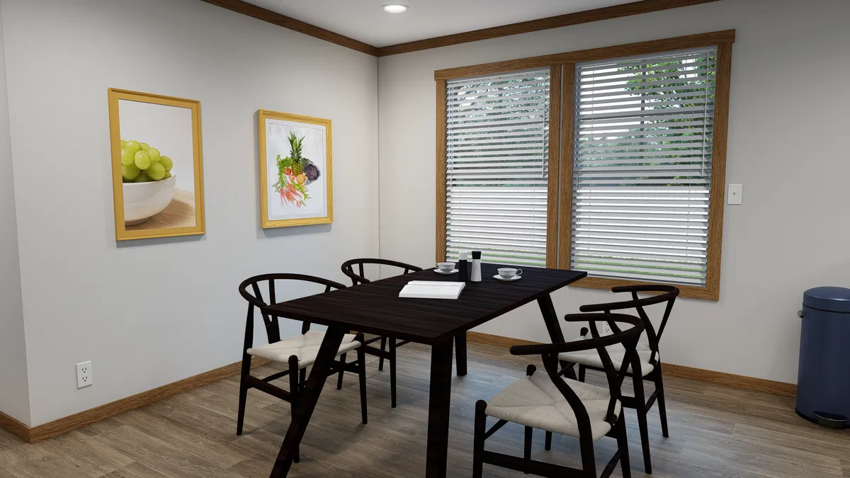 The HUDSON Dining Area. This Manufactured Mobile Home features 3 bedrooms and 2 baths.