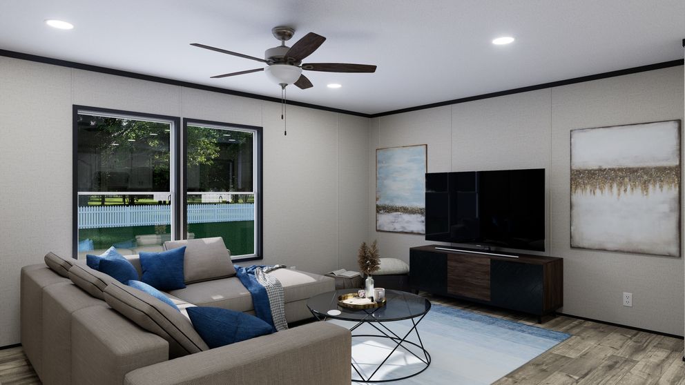 The THE MOUNTAINEER 52 Living Room. This Manufactured Mobile Home features 3 bedrooms and 2 baths.