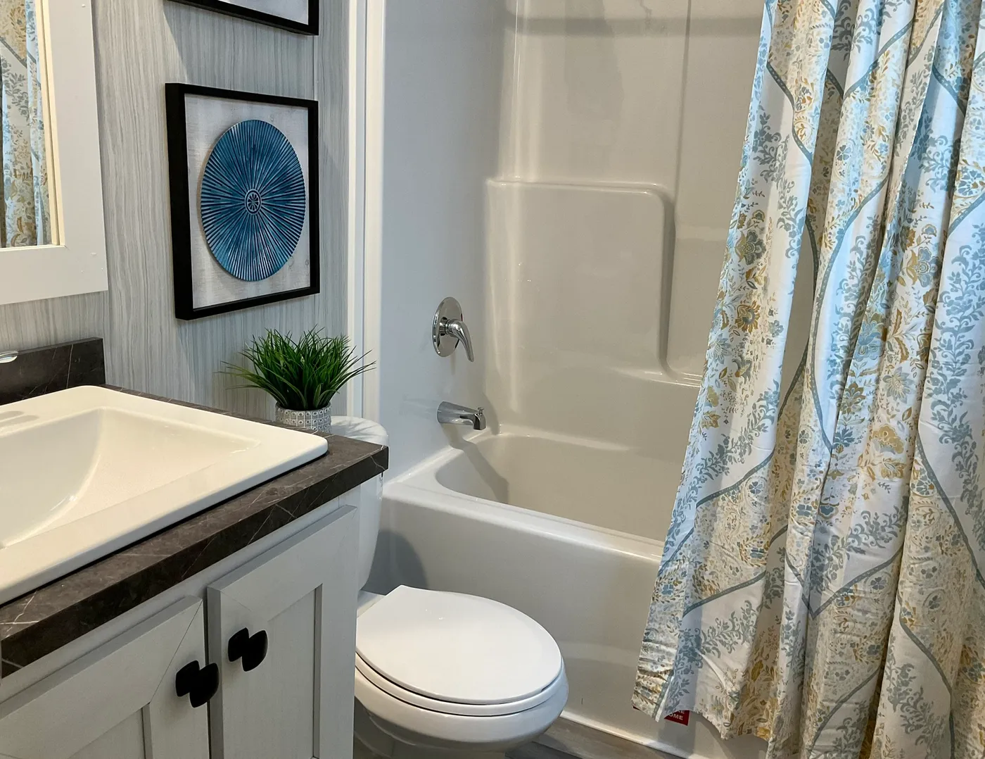 The AMETHYST Guest Bathroom. This Manufactured Mobile Home features 3 bedrooms and 2 baths.