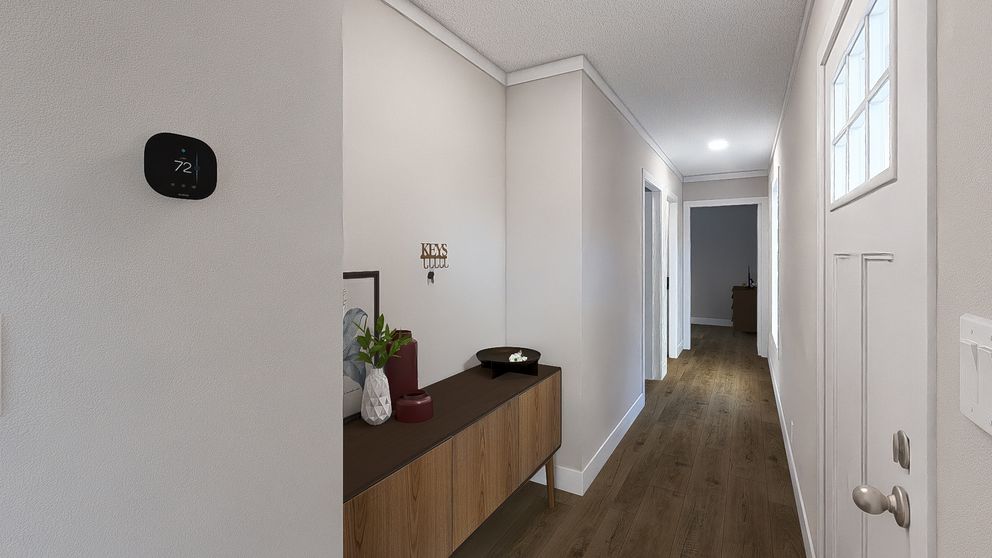 The RHYTHM NATION Foyer. This Manufactured Mobile Home features 3 bedrooms and 2 baths.