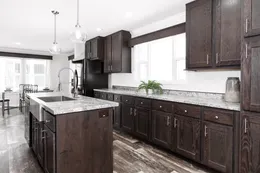 The CASTLE PINES Kitchen. This Manufactured Mobile Home features 3 bedrooms and 2 baths.