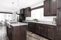 The CASTLE PINES Kitchen. This Manufactured Mobile Home features 3 bedrooms and 2 baths.