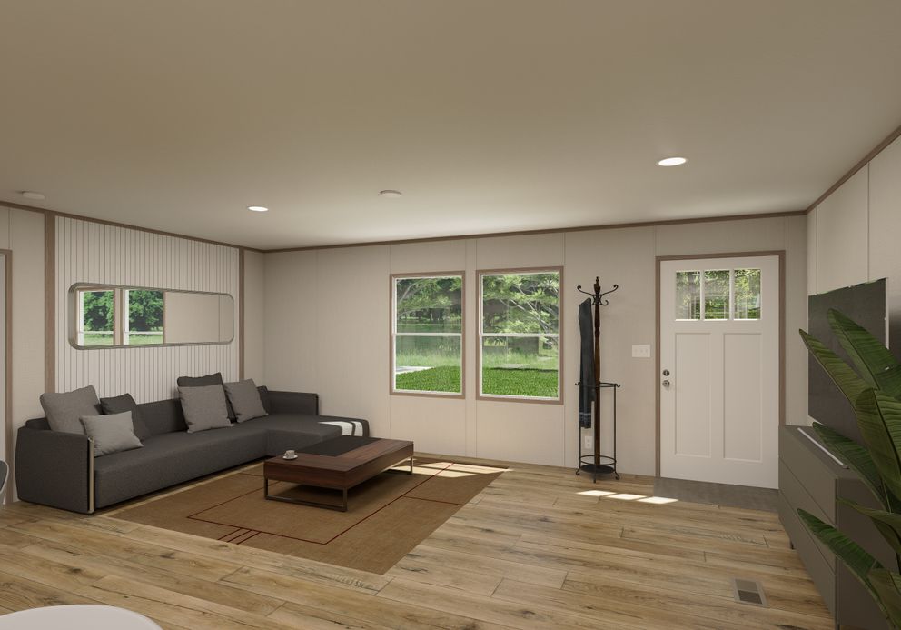 The ULTRA FLEX Living Room. This Manufactured Mobile Home features 4 bedrooms and 2 baths.