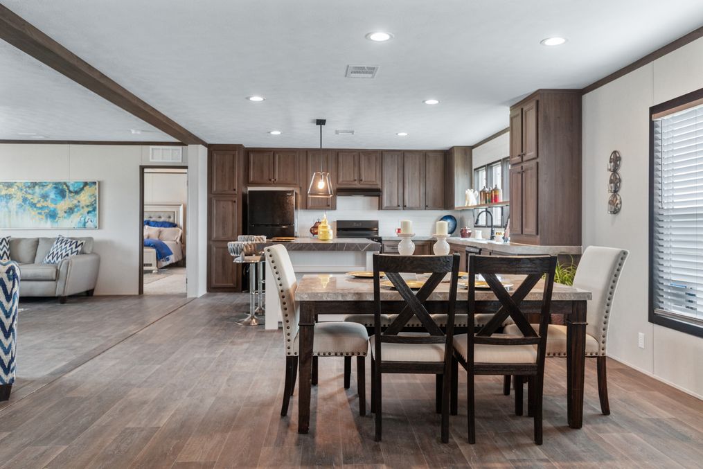 The HERCULES Dining Room. This Manufactured Mobile Home features 4 bedrooms and 2 baths.