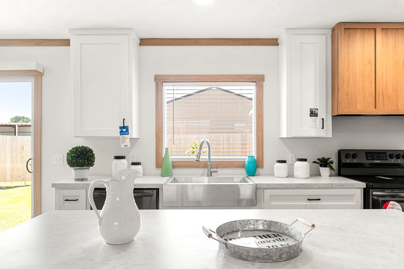 The LIZZIE Kitchen. This Manufactured Mobile Home features 3 bedrooms and 2 baths.
