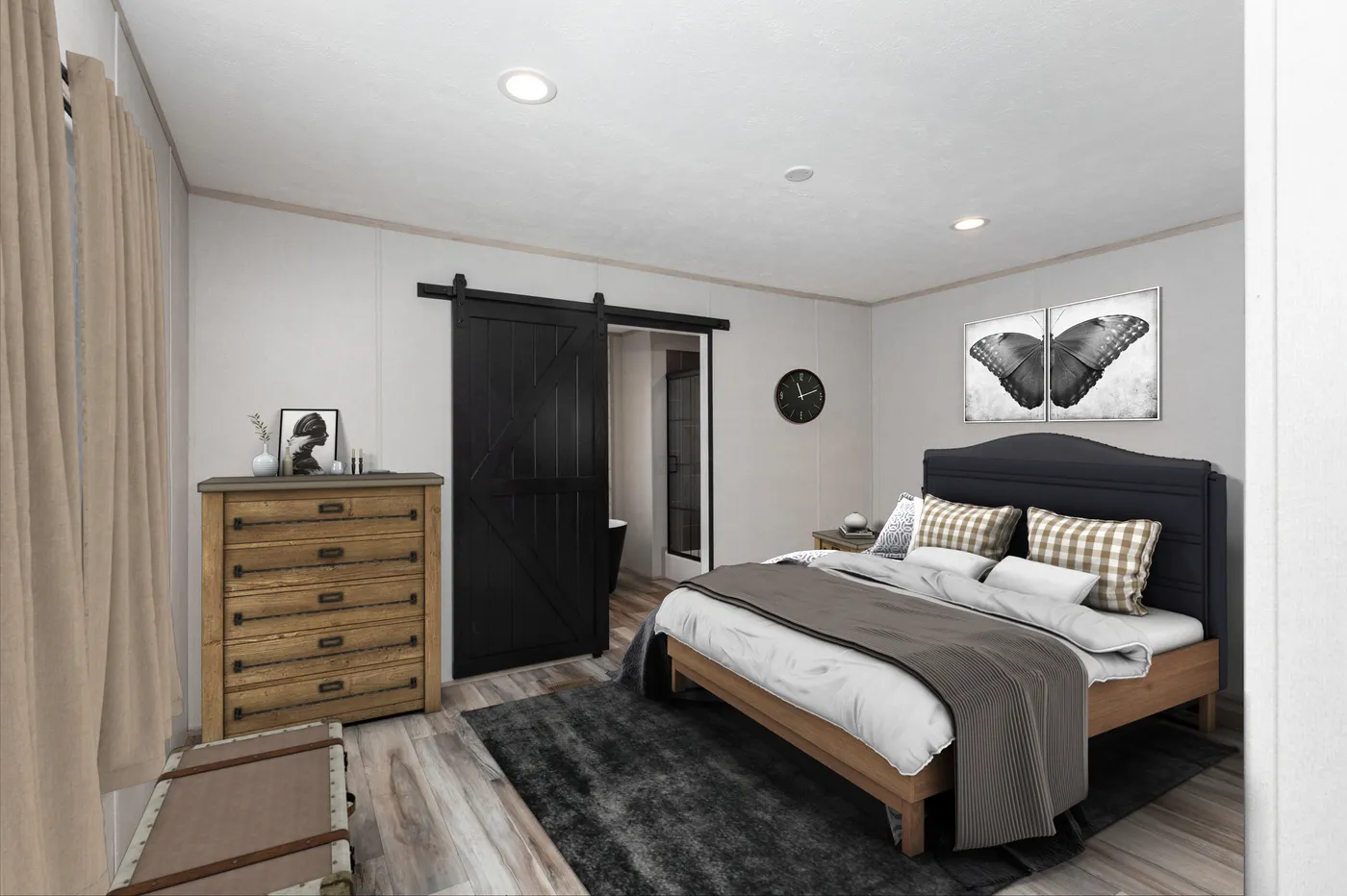 The ANNIVERSARY JEWEL Primary Bedroom. This Manufactured Mobile Home features 3 bedrooms and 2 baths.