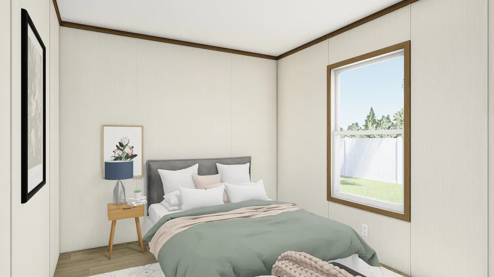 The THE REVEAL Guest Bedroom. This Manufactured Mobile Home features 3 bedrooms and 2 baths.