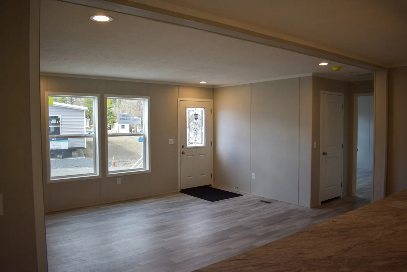 The MOONSTONE 60 Living Room. This Manufactured Mobile Home features 3 bedrooms and 2 baths.