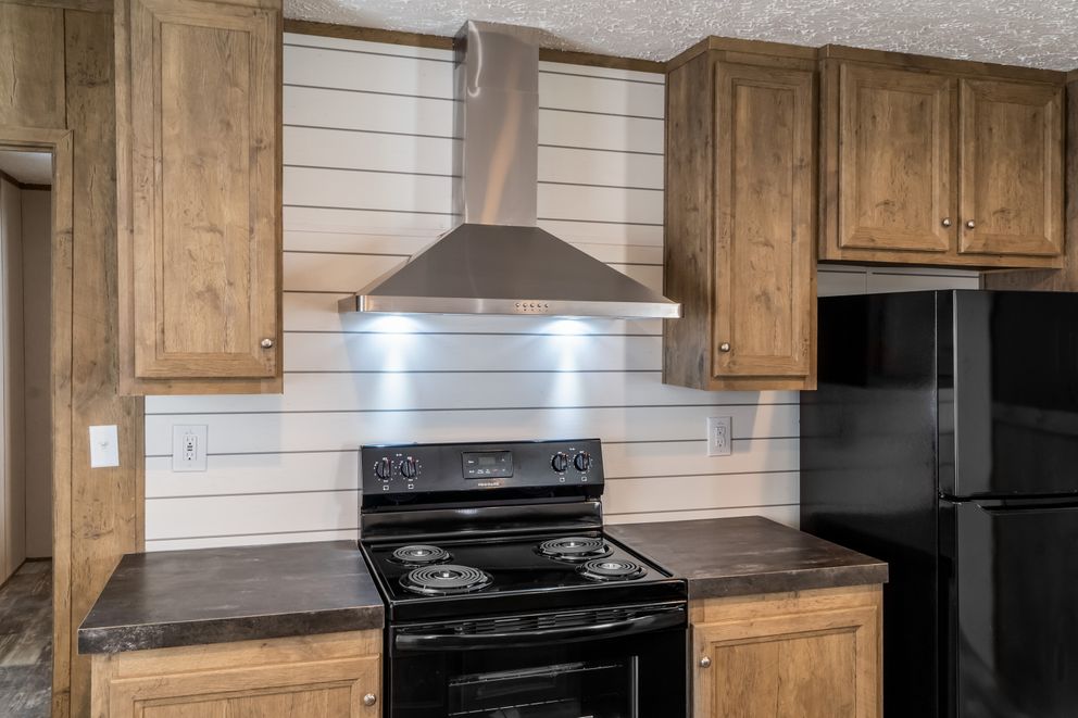 The THE BREEZE Exterior. This Manufactured Mobile Home features 3 bedrooms and 2 baths.