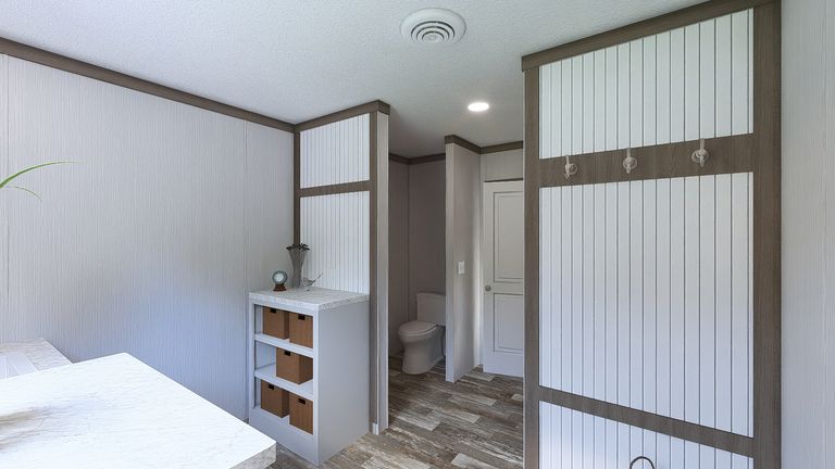 The ULTRA ISLAND BREEZE 56' Primary Bathroom. This Manufactured Mobile Home features 3 bedrooms and 2 baths.