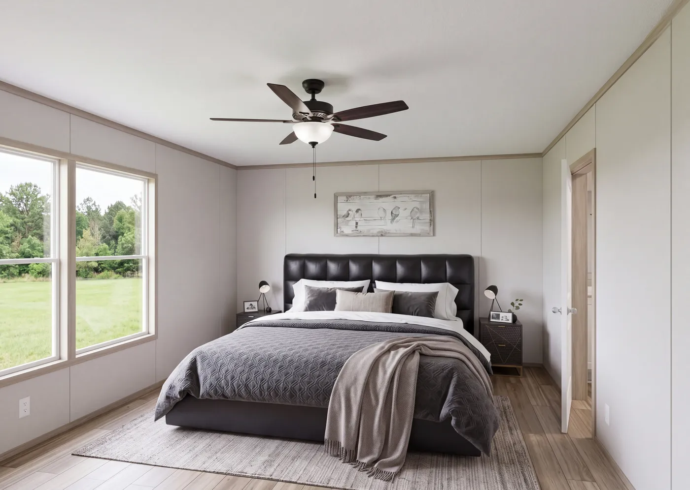 The THE MOUNTAINEER 76 Primary Bedroom. This Manufactured Mobile Home features 4 bedrooms and 2 baths.