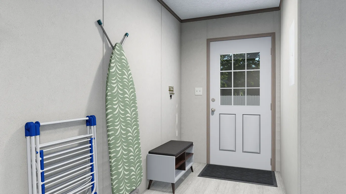 The 5228-5785 THE PULSE Utility Room. This Manufactured Mobile Home features 3 bedrooms and 2 baths.