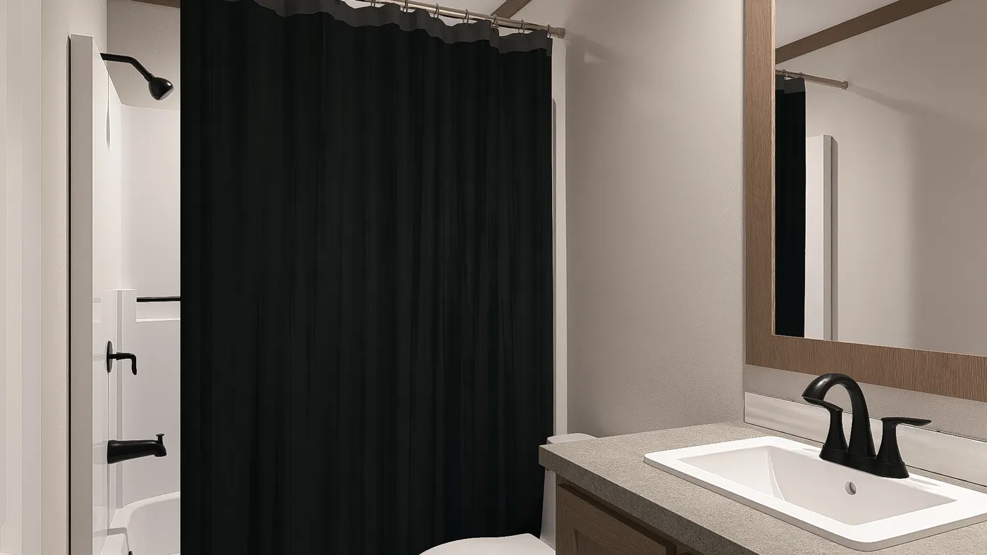 The LIZZIE Guest Bathroom. This Manufactured Mobile Home features 3 bedrooms and 2 baths.