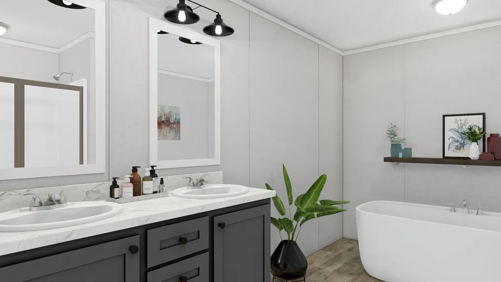 The THE FUSION C Primary Bathroom. This Manufactured Mobile Home features 3 bedrooms and 2 baths.