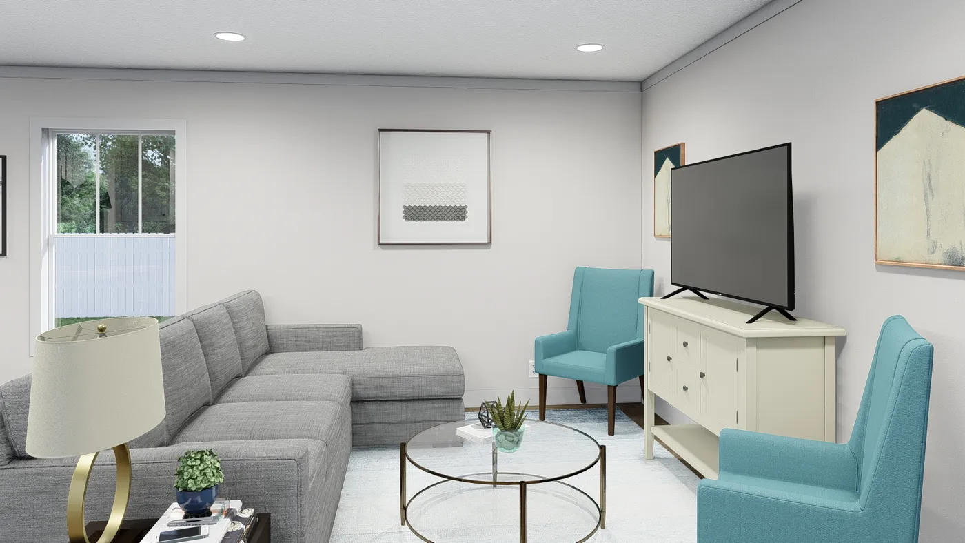 The BORN TO RUN Living Room. This Manufactured Mobile Home features 2 bedrooms and 2 baths.