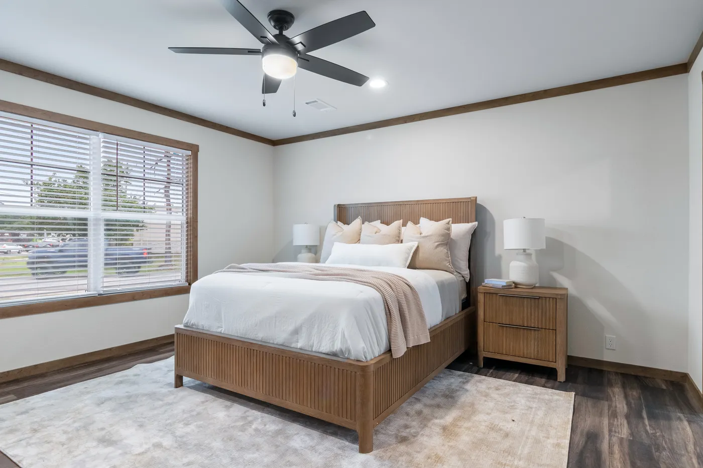 The EVERETT ELITE Primary Bedroom. This Manufactured Mobile Home features 4 bedrooms and 3 baths.