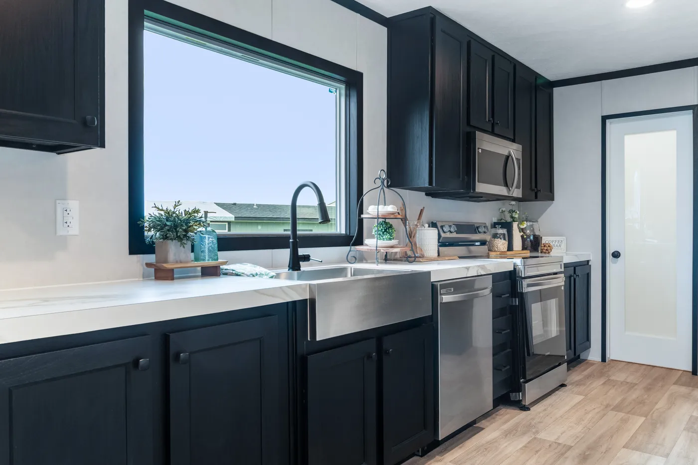 The ODYSSEY Kitchen. This Manufactured Mobile Home features 4 bedrooms and 2 baths.
