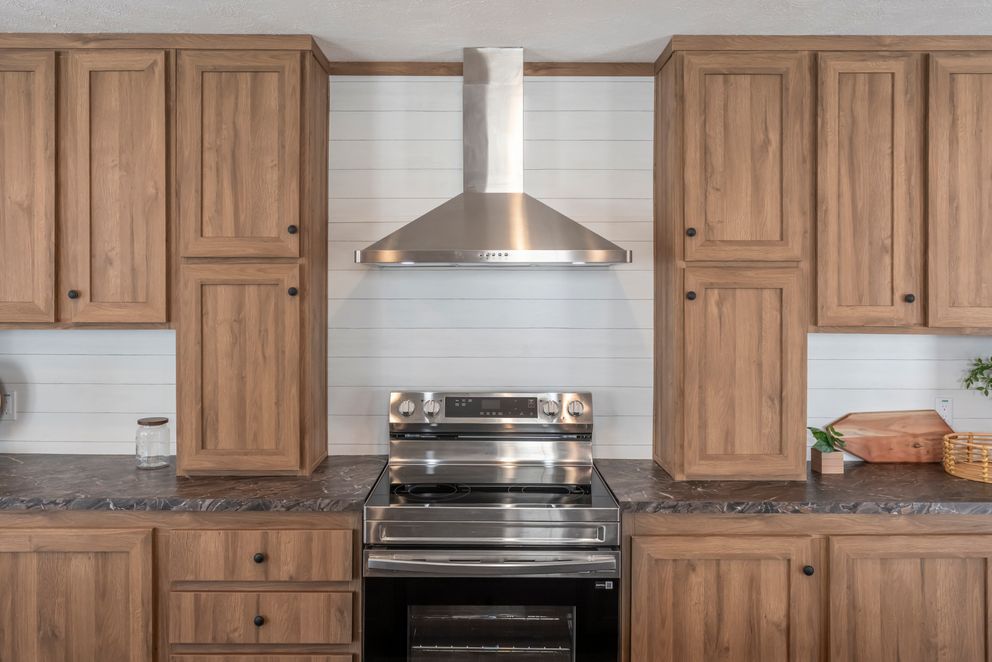 The BLACK DIAMOND Kitchen. This Manufactured Mobile Home features 3 bedrooms and 2 baths.