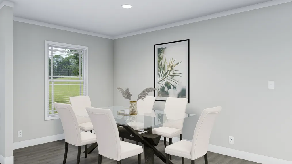 The THE BREEZE Dining Area. This Manufactured Mobile Home features 3 bedrooms and 2 baths.