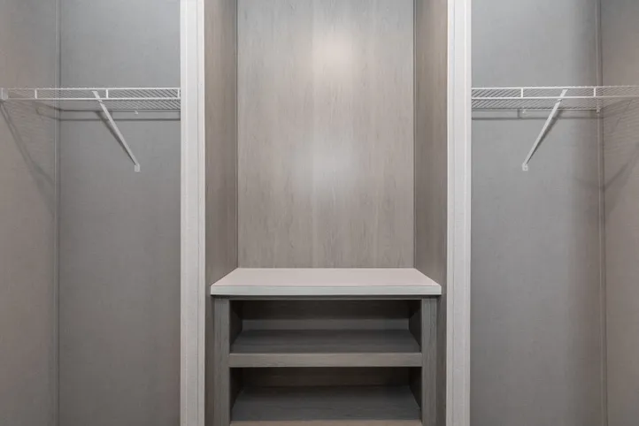 The PLATINUM ANNIVERSARY Primary Bedroom. This Manufactured Mobile Home features 3 bedrooms and 2 baths.