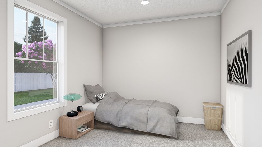 The BROWN EYED GIRL Guest Bedroom. This Manufactured Mobile Home features 4 bedrooms and 2 baths.