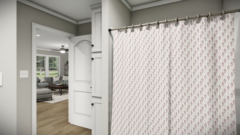 The THE WASHINGTON Guest Bathroom. This Manufactured Mobile Home features 3 bedrooms and 2 baths.