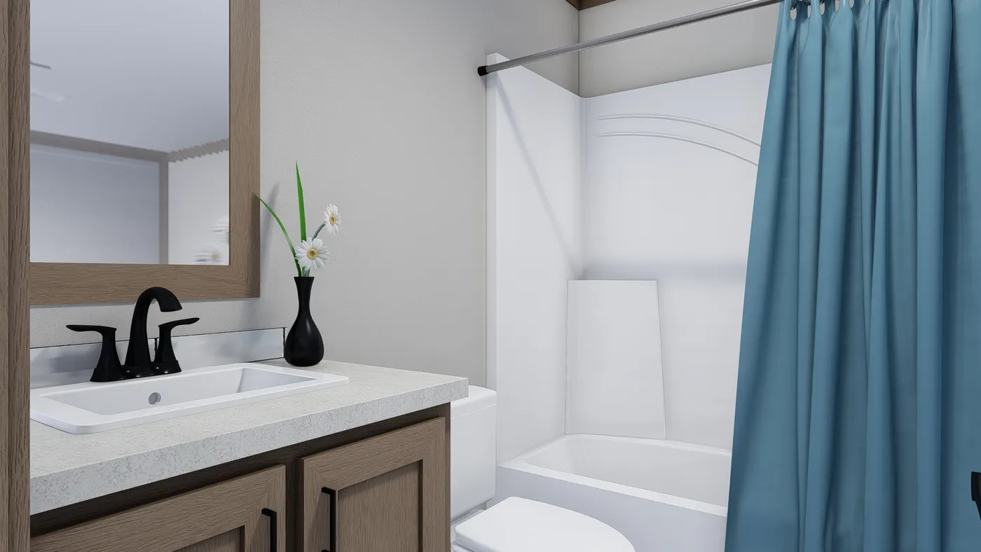 The LIBBY Guest Bathroom. This Manufactured Mobile Home features 3 bedrooms and 2 baths.