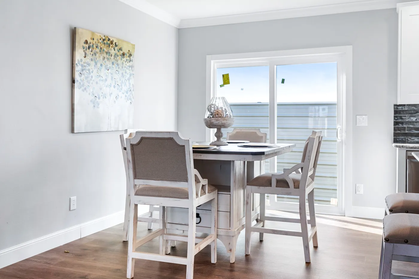 The THE FUJI Dining Room. This Manufactured Mobile Home features 4 bedrooms and 3 baths.